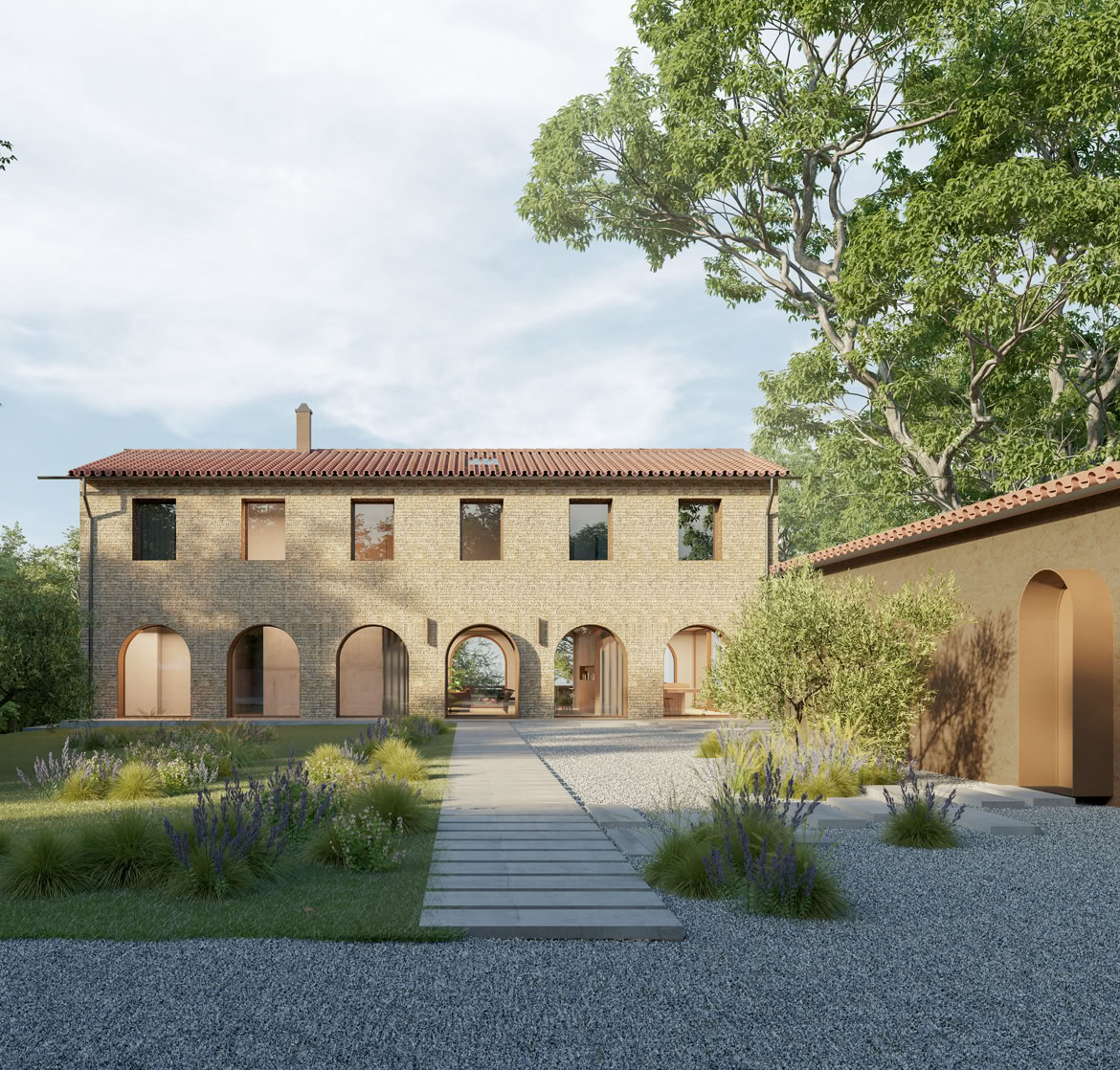 Entrance of the stone farmhouse with bronze metal frames and modern finishes.