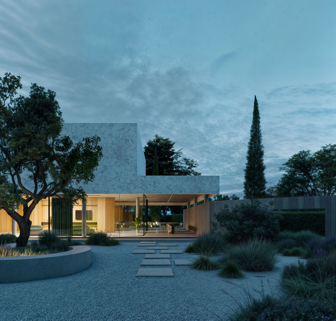 Vista notturna della villa con illuminazione architetturale che enfatizza la linearità delle forme e il dialogo tra pieni e vuoti.