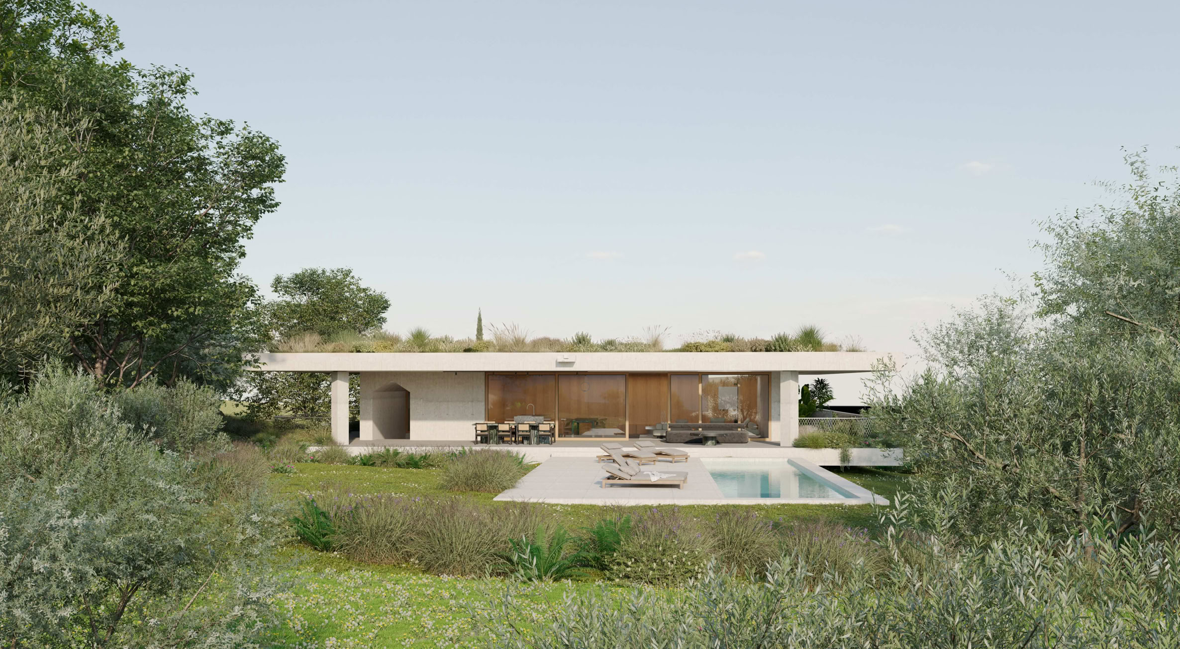 Villa sulla Soglia vista dal giardino: zona giorno vetrata, portico e piscina costruiscono una continuità tra interno e paesaggio.