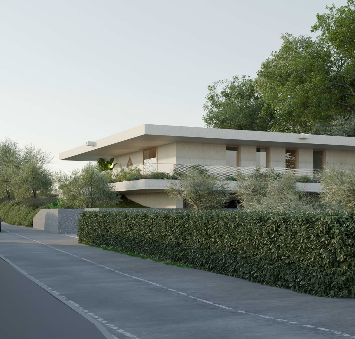 Street view of Villa sulla Soglia in Soiano del Lago, a contemporary concrete villa surrounded by the Valtenesi landscape.