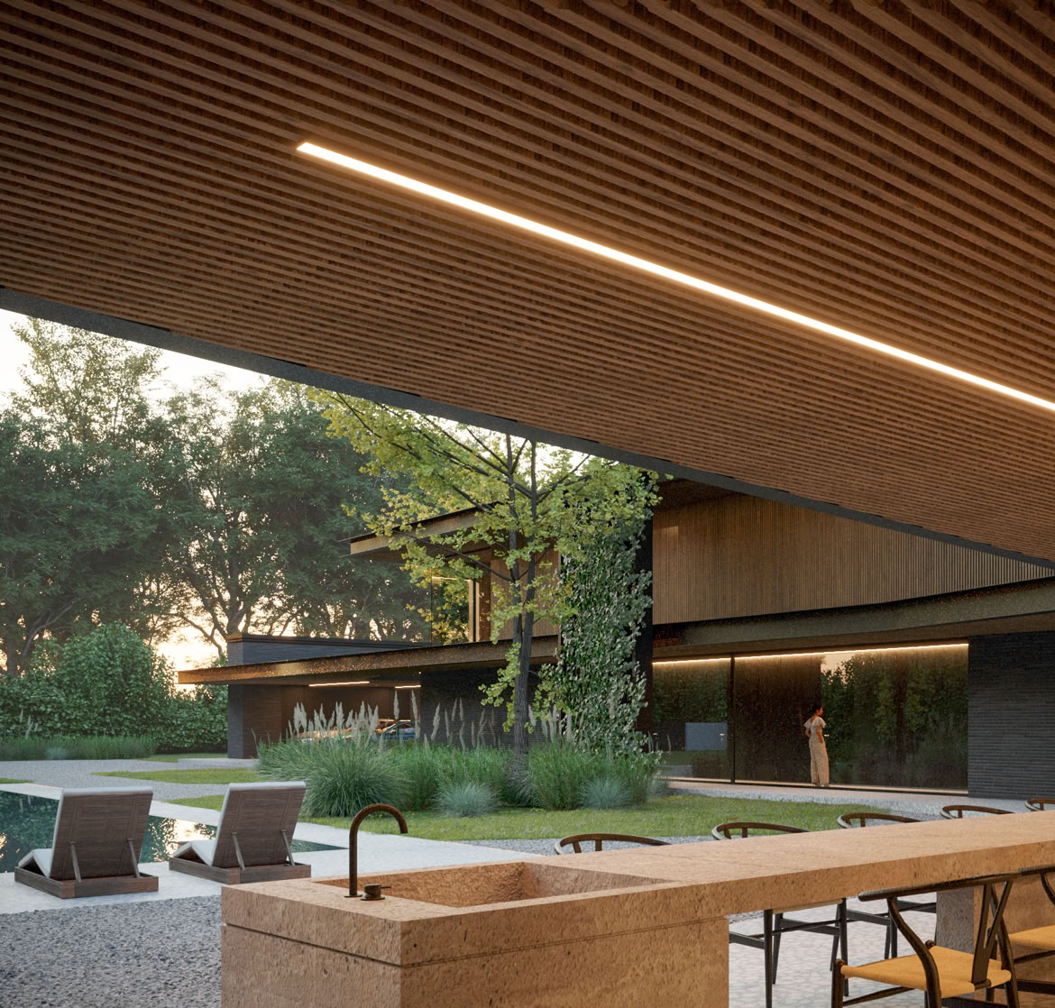 Covered outdoor space extending the living area towards the garden and swimming pool.