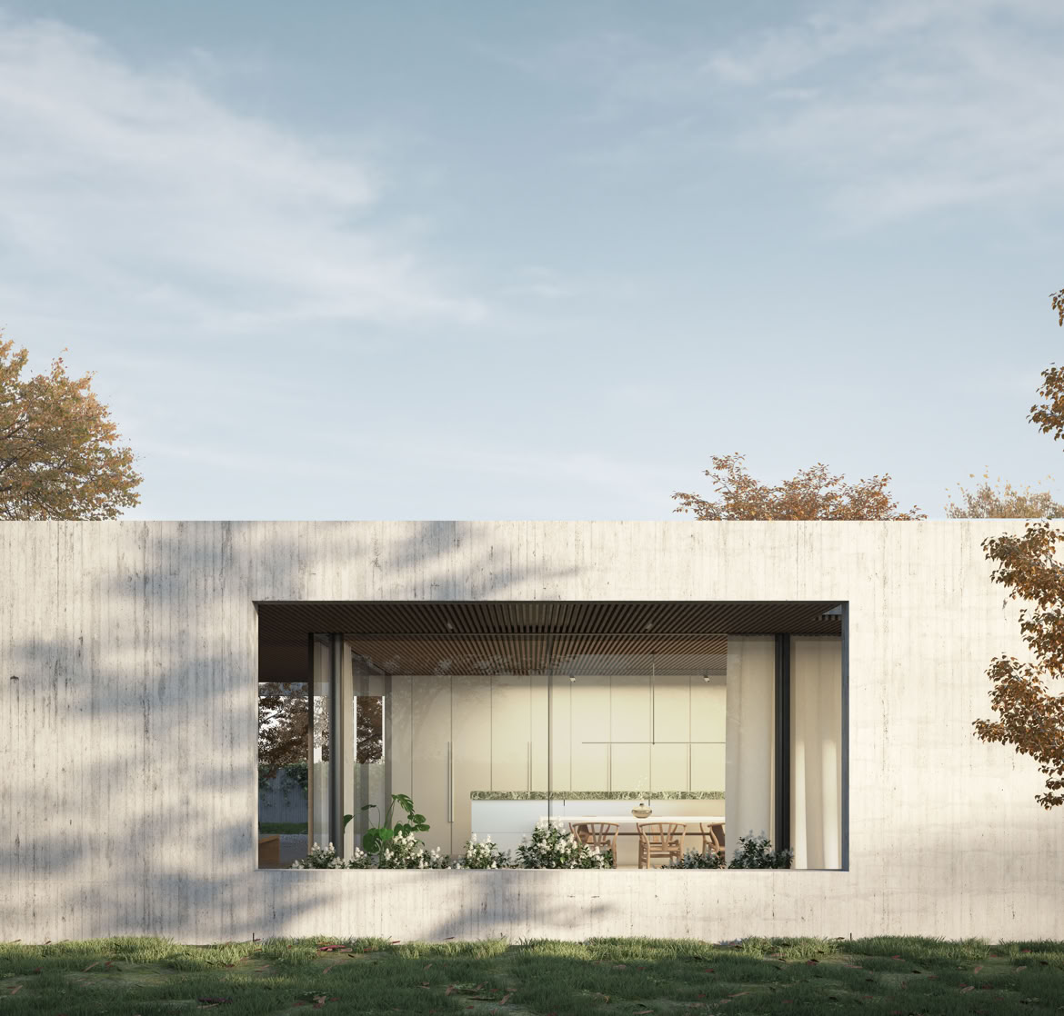 Vista esterna della villa a San Donà di Piave progettata da MIDE architetti immersa nel verde e disegnata con geometrie pulite che regalano privacy all'abitazione.