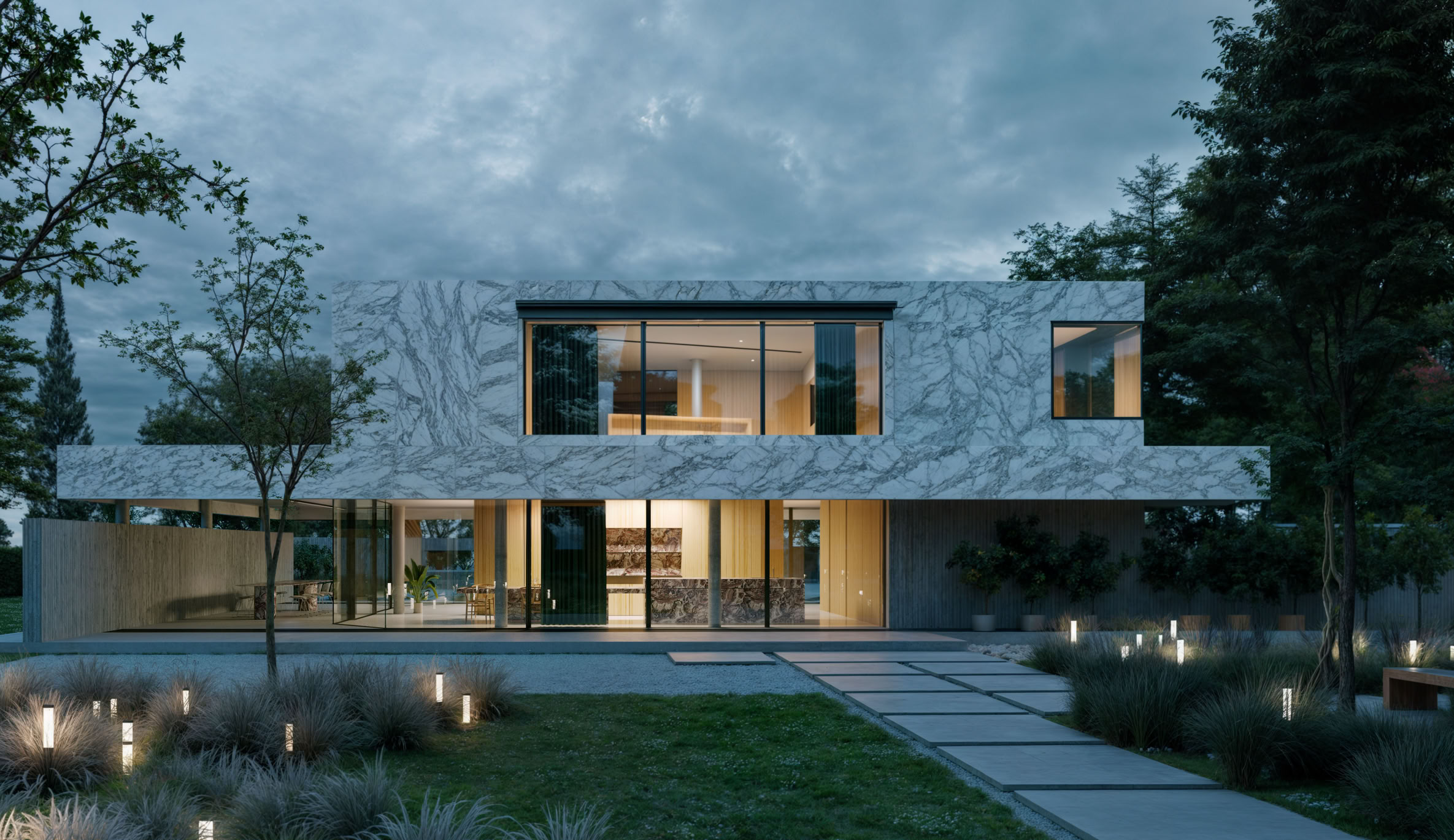 Vista notturna della villa con illuminazione architetturale che enfatizza la linearità delle forme e il dialogo tra pieni e vuoti.