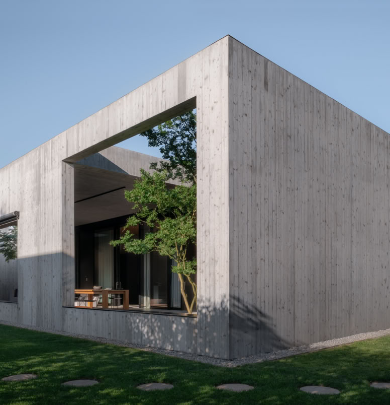 Progetto di MIDE architetti di una villa con corte interna e aperture architettoniche.