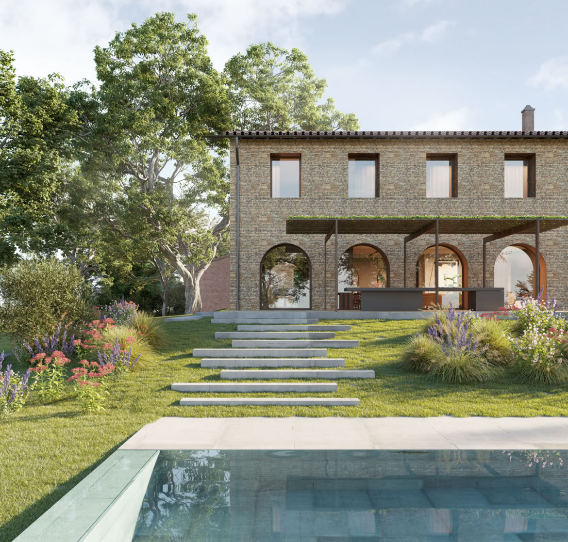 Exterior view of two-level villa with ground floor arches and private garden in Emilia-Romagna.